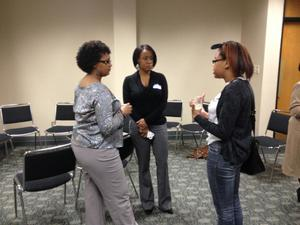 Three women mingling at BSE 2012