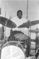 Cleve Carter, Sr., playing the drums with a band at Tom's Place at 648 South Holt Street in Montgomery, Alabama.