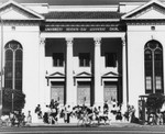 Parade watchers in front of Church