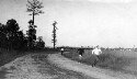 Men running in a sports event. - 100 yard dash. Sussex County School Fair