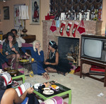 Gwen Gordy Fuqua and Chris Clark talking at a party, Los Angeles