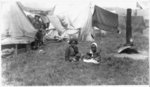 [2 African American children amid tents in refugee camp after San Francisco earthquake and fire]