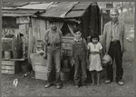 Senor Vigues, wife and 5 children - live in this homemade shack opposite American-Mexican "Jim Crow" housing project, "Santa Rita"