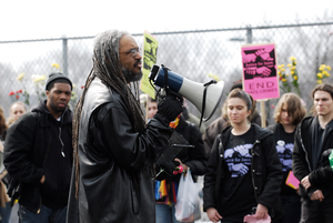 Justice for Jason rally at UMass Amherst: UMass professor Amilcar Shabazz addressing protesters in support of Jason Vassell