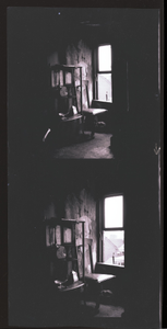 House interior: strip of two black-and-white photonegatives.