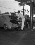 Service station employee, Los Angeles, 1964