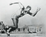 Action image of Ralph Metcalfe starting sprint, 1934