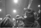 Thumbnail for Adults and children at a rally in the Municipal Auditorium in Birmingham, Alabama, during Lurleen Wallace's gubernatorial campaign.