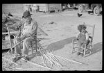 Mixed-breed Indian, white and Negro, near Pembroke Farms, making new chair seat. North Carolina