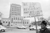 Man marching toward the Jefferson County Courthouse in downtown Birmingham, Alabama, for a voter registration rally.