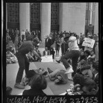 Thumbnail for Crowd watching CORE members demonstrating non-violent protection skills on steps of Los Angeles Federal Building, 1965