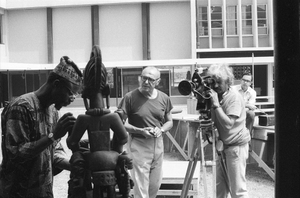 Eliot Elisofon and cameraman George Bracher filming renowned woodcarver Lamidi Olonade Fakeye, Ibadan, Nigeria