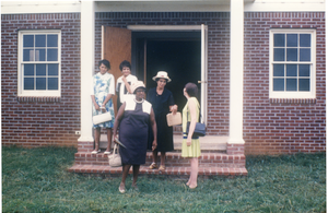 Marjorie Merrill (far right) and church ladies in front of rebuilt Antioch Church, Blue Mountain, Miss.