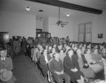 People waiting to receive baskets of food from the Salvation Army at the Citadel at 308 North Lawrence Street in Montgomery, Alabama, on Christmas Eve.