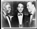 [Jackie Robinson (left), Roy Wilkins (center), and Duke Ellington (right), talking during the Spingarn Medal Awards ceremony]