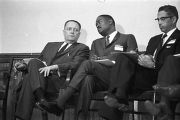 Congressman Carl Elliott seated with two other men during a meeting of educators at Alabama State College in Montgomery, Alabama.