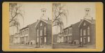 [Street view of the German Lutheran Church and other buildings at the corner of East Pomfret and South Bedford Streets in Carlisle, Pennsylvania]