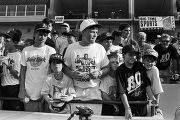 Boys watching Bo Jackson play during a Birmingham Barons baseball game in Birmingham, Alabama.