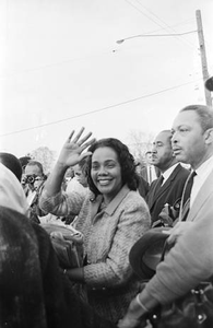 Coretta Scott King smiling and waving on the last day of the Selma to Montgomery March in Montgomery, Alabama.