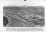 "Nov. 5--Army takes over Jap Segregation Center"--caption on photograph front "Tule Lake--This is a section of the Tule Lake Relocation center which the Army yesterday took over and began construction of a high, barbed-wire fence to keep in check the thousands of Japanese held there"--caption on photograph back