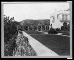 Pasadena, California, Mrs. Herbert Coppell home - view of formal lawn, gardens, and hills in background