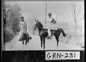 Photograph of two minstrels on horseback, Greensboro, Greene County, Georgia, 1934 Apr. 16