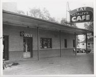 Mississippi State Sovereignty Commission photograph of the exterior of Stanley's Cafe showing the front door and window, Winona, Mississippi, 1961 November 1