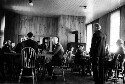 Unidentified group of men and women seated