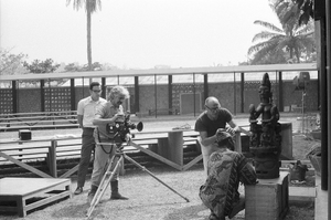 Eliot Elisofon and cameraman George Bracher filming renowned woodcarver Lamidi Olonade Fakeye, Ibadan, Nigeria