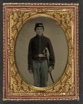 [Unidentified young soldier in Union artilleryman's uniform standing with Eaglehead sword]