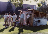 Image of signs, protests and displays put together by the SAA group on the University of Utah campus during political activity of the worldwide community to put an end to segregation in South Africa.