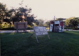 Image of signs, protests and displays put together by the SAA group on the University of Utah campus during political activity of the worldwide community to put an end to segregation in South Africa.