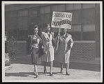 [Three African American women with sign reading, "Segregation is discrimination"]