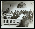 Beatrice Lott speaking to a group in a church