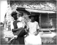 African American family in front of their home.