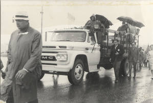 Marchers walking in the rain in Montgomery during the Selma to Montgomery March.