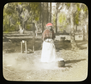 Middleton Place: women stirring a kettle outside; possibly Annette Mayes, born a slave and lived as a free woman at Middleton Place until the 1930s.