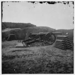 [Morris Island, S.C. Two 100-pdr. Parrott guns and stacks of shells inside Fort Putnam]