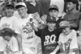 Boys watching Bo Jackson play during a Birmingham Barons baseball game in Birmingham, Alabama.