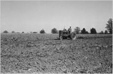 African American man on tractor working 2 [Slide Farm-13]