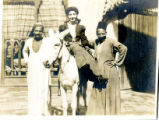 Egyptian men with donkey
