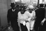 Mahalia Jackson and others outside Ebenezer Baptist Church, probably about to enter the building for Martin Luther King, Jr.'s funeral service.