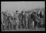 [Untitled photo, possibly related to: Negroes in the lineup for food at the flood refugee camp, Forrest City, Arkansas]