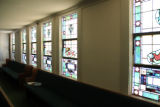 Green Street Baptist Church: sanctuary interior, stained glass windows, south wall