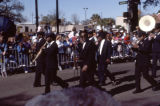 The Excelsior Band marching in the Joe Cain Day Mardi Gras procession in Mobile, Alabama.