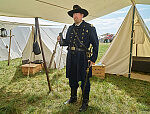 Costumed character Gary Carlberg at the re-enactment, held each American Independence Day Weekend (on and surrounding July 4), of various skirmishes at the decisive 1863 Battle of Gettysburg, in Pennsylvania, which turned the tide of the American Civil War against the outmanned, rebellious Confederates for good. Mr. Carlberg, a retired Army reservist from White Bear Lake, Minnesota, who works at the Pentagon outside Washington, depicts Col. William Colvill of the Union Army's 1st Minnesota Infantry Regiment at the battle