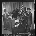 Ben Pollock, Kid Ory, Emma Barrett, Johnny St. Cyr, Louis Armstrong, and Sharkey Bonano performing at Hollywood Knickerbocker in 1961