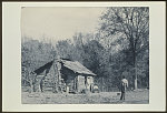 [Three African Americans outside a cabin, possibly Mt. Meigs, Alabama]