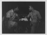 Thumbnail for Two men at a table