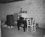 Printing press, chemicals, and other paraphernalia inside a cinder block shed used by Ku Klux Klan members in Jefferson County, Alabama.